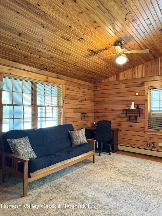 29 Fallen Tree Ln, Athens, NY 12015 - living area with a baseboard radiator, vaulted ceiling, a ceiling fan, wooden ceiling, and wooden walls