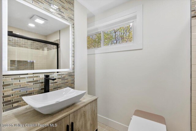 603-607 Old Stage Rd, Saugerties, NY 12477 - full bathroom with a sink, a stall shower, baseboards, and toilet