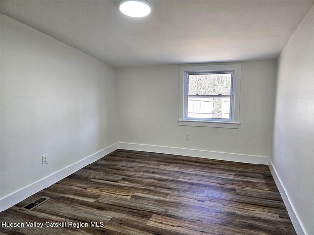603-607 Old Stage Rd, Saugerties, NY 12477 - spare room with dark wood finished floors and baseboards
