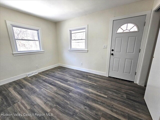 603-607 Old Stage Rd, Saugerties, NY 12477 - entrance foyer featuring healthy amount of natural light, dark wood finished floors, and baseboards