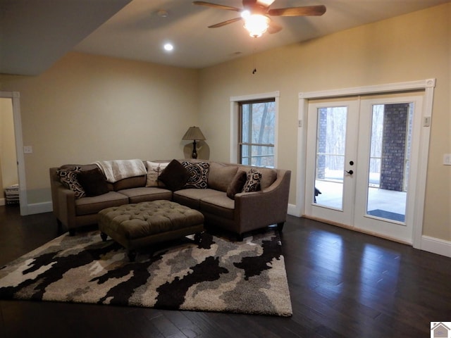 living room featuring ceiling fan, dark wood-type flooring, and french doors