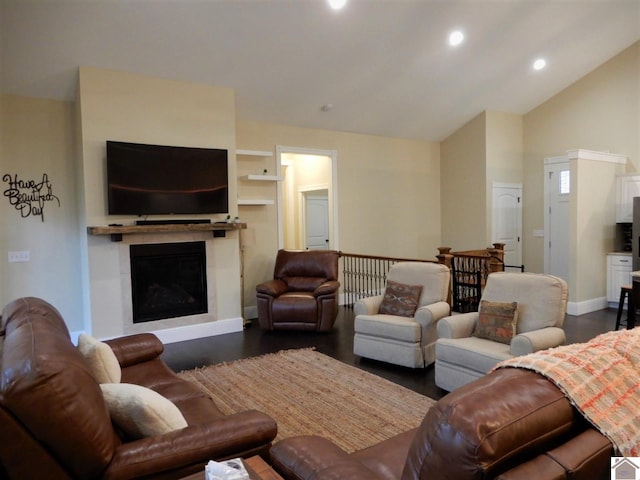 living room featuring dark hardwood / wood-style floors and vaulted ceiling