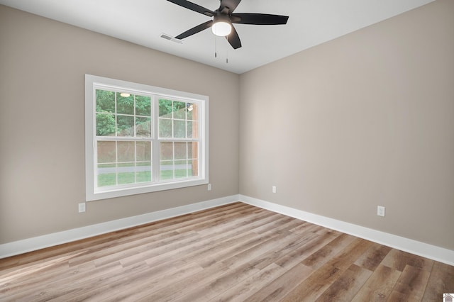 unfurnished room with light hardwood / wood-style floors and ceiling fan