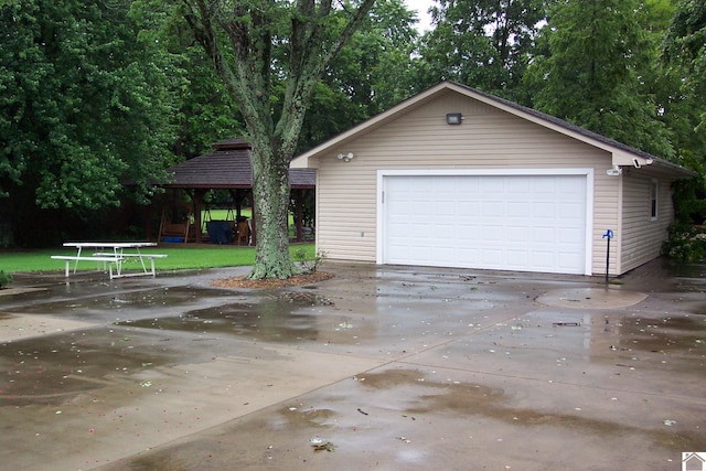 garage featuring a yard