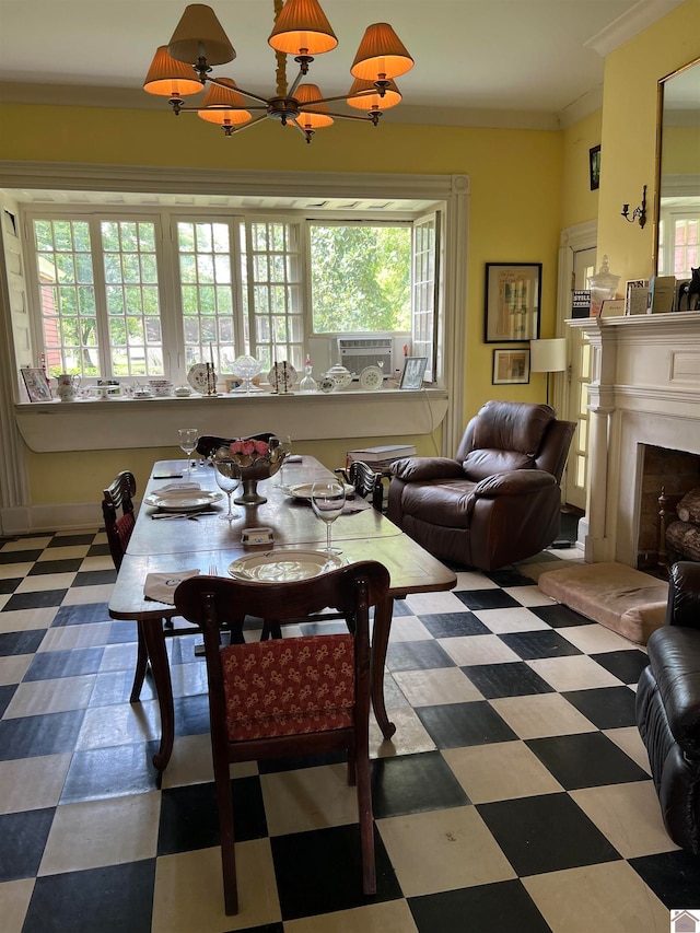 tiled dining area with an inviting chandelier and ornamental molding