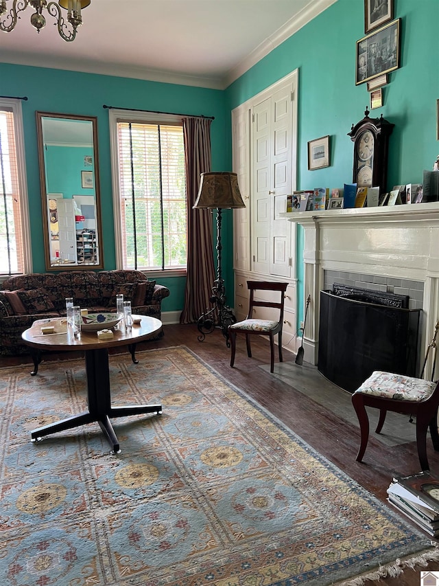 living room featuring ornamental molding and hardwood / wood-style flooring