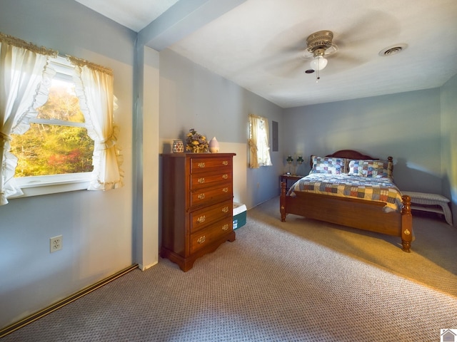 carpeted bedroom featuring ceiling fan