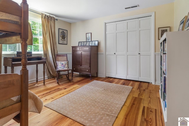 sitting room featuring light hardwood / wood-style flooring