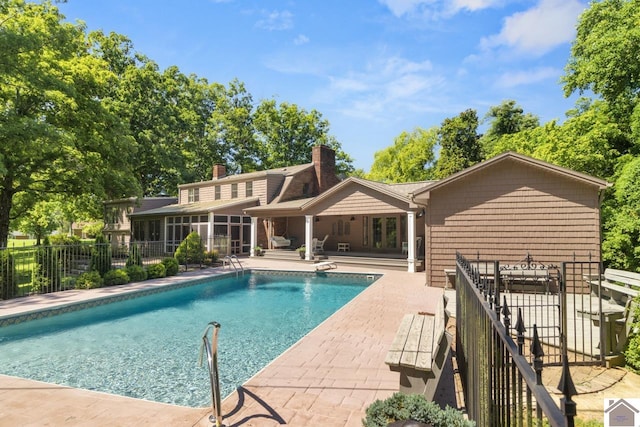 view of pool featuring a patio area