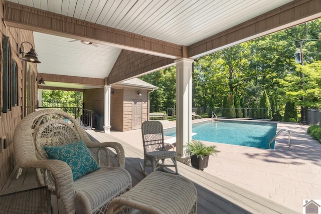 view of swimming pool featuring a patio