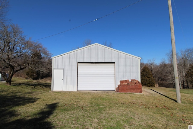 garage with a yard