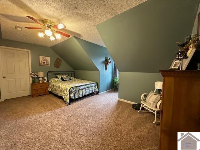 carpeted bedroom with vaulted ceiling, a textured ceiling, and ceiling fan