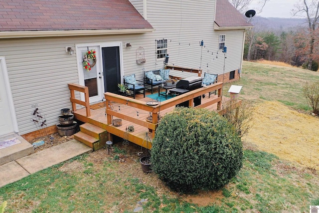 deck featuring a lawn