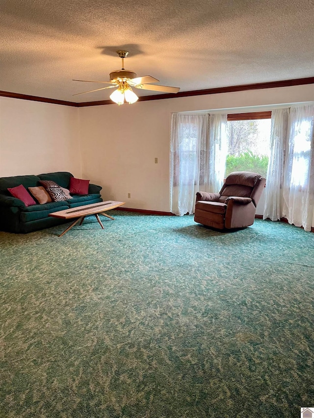 unfurnished room with carpet flooring, a textured ceiling, and ceiling fan