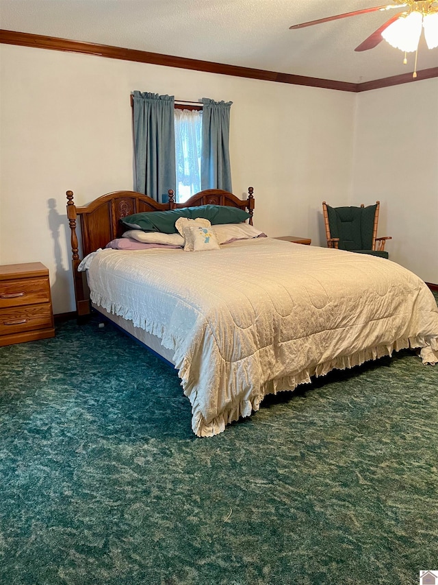 bedroom featuring ceiling fan, ornamental molding, dark colored carpet, and a textured ceiling