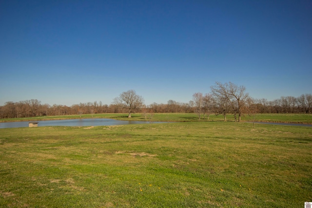 view of yard with a water view