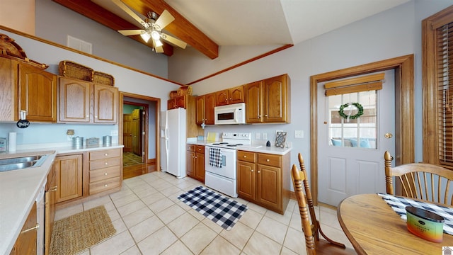 kitchen with white appliances, vaulted ceiling with beams, ceiling fan, and light tile floors