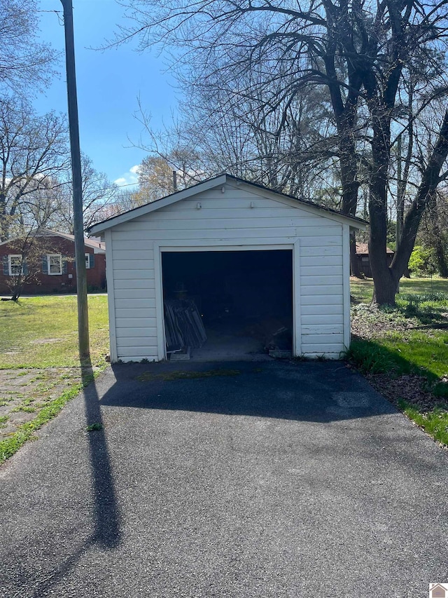 garage with a yard