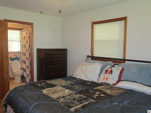 bedroom with connected bathroom