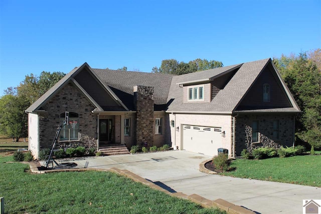 view of front of property with a front yard and a garage