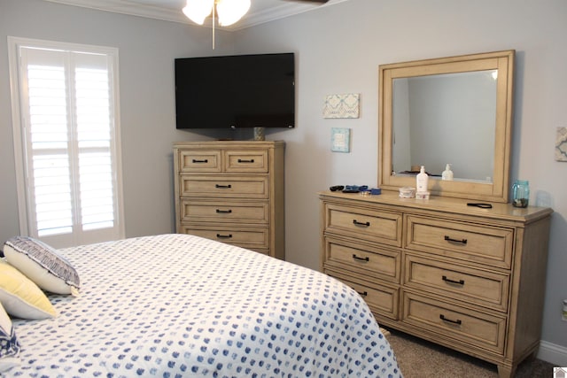 carpeted bedroom featuring ornamental molding