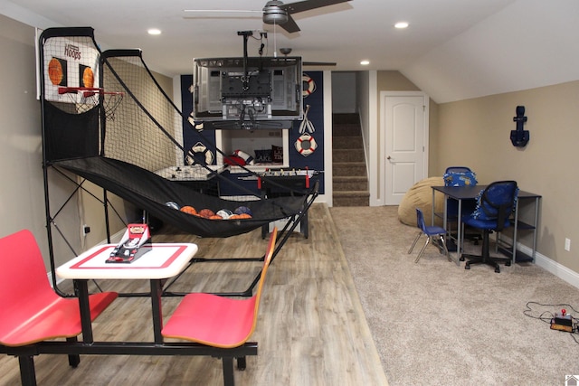 interior space featuring lofted ceiling, ceiling fan, and light wood-type flooring