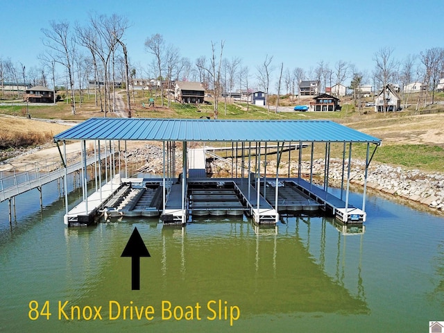 dock area with a water view