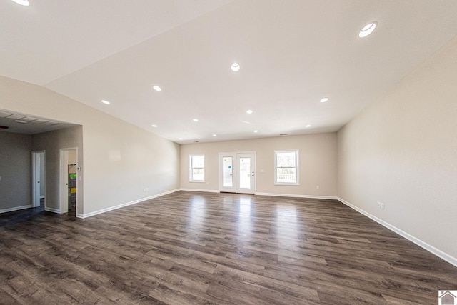 unfurnished room featuring dark hardwood / wood-style flooring and french doors