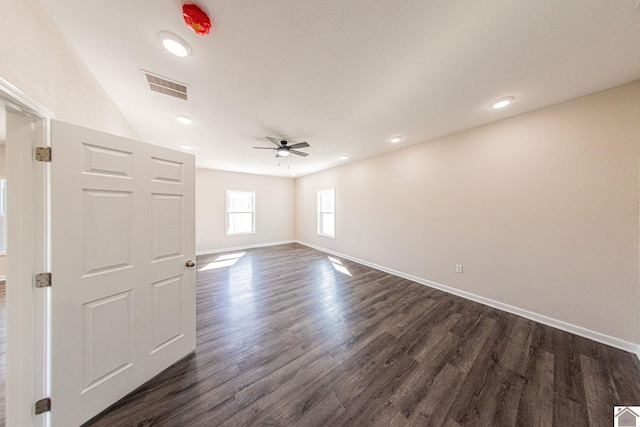 unfurnished room featuring dark hardwood / wood-style flooring and ceiling fan