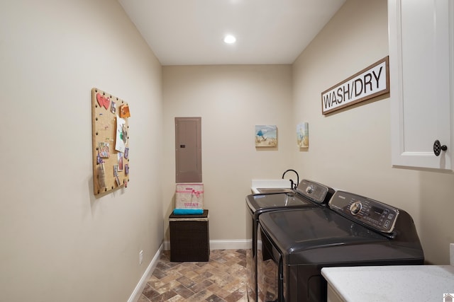 laundry area featuring washer and clothes dryer and sink