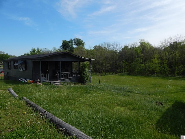 view of yard with a sunroom