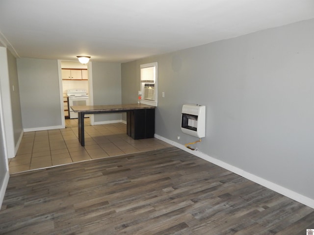 interior space featuring dark tile flooring