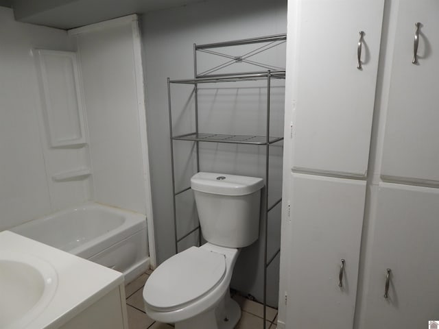 full bathroom with shower / bathing tub combination, toilet, tile flooring, and vanity