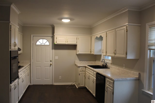 kitchen with sink, white cabinetry, crown molding, dark hardwood / wood-style flooring, and black appliances