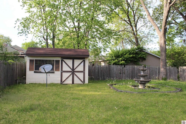 view of outdoor structure featuring a yard