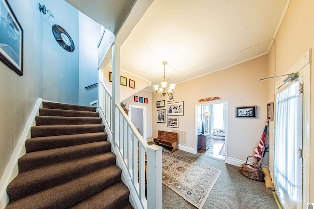 stairs featuring carpet floors and a chandelier