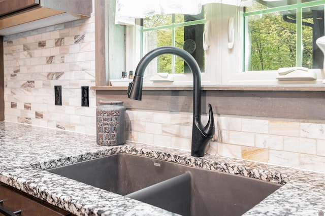 interior details with tasteful backsplash and vanity