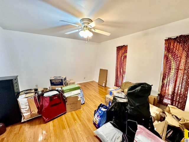 bedroom featuring ceiling fan and hardwood / wood-style floors