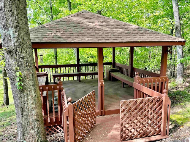 wooden deck featuring a gazebo