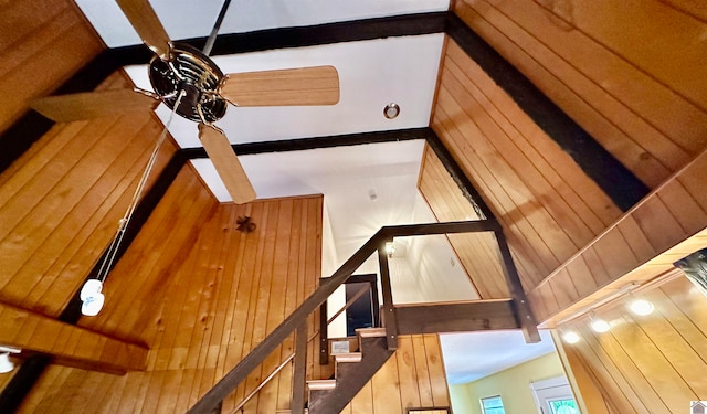 interior details with beamed ceiling and ceiling fan