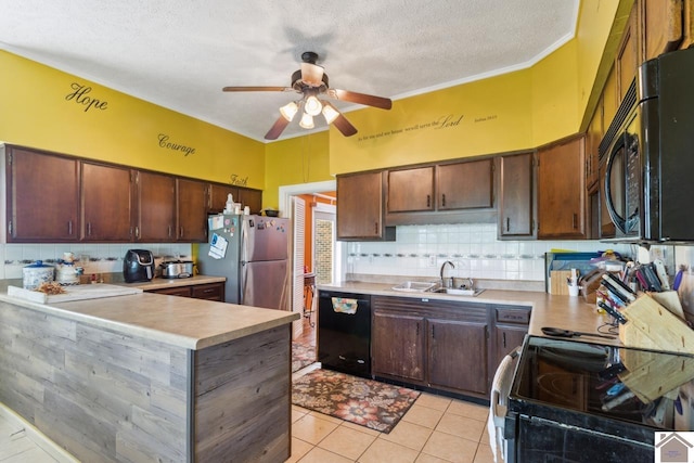 kitchen with ceiling fan, light tile flooring, backsplash, and black appliances