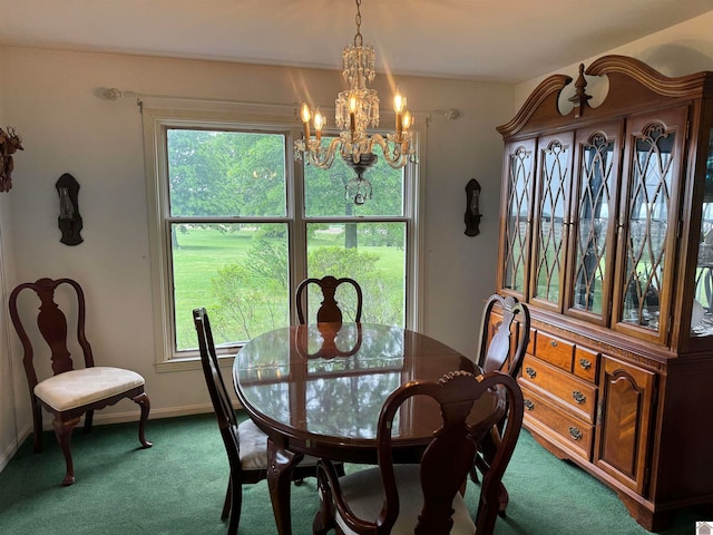 carpeted dining room featuring an inviting chandelier