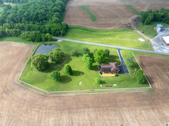 drone / aerial view featuring a rural view and a water view