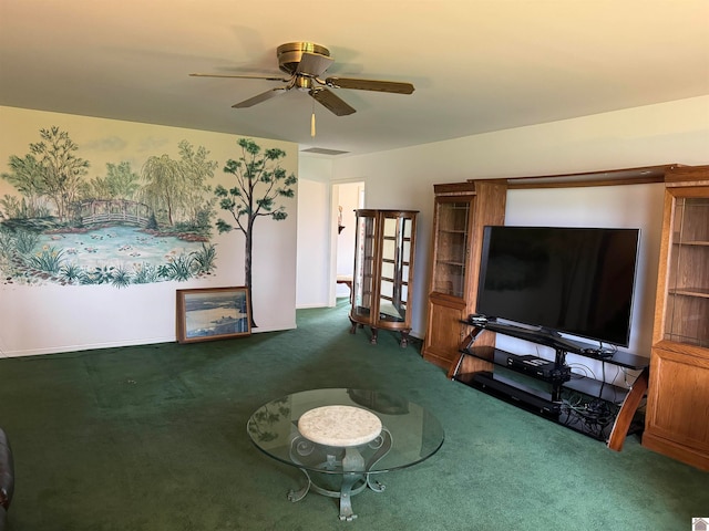 unfurnished living room with ceiling fan and dark colored carpet