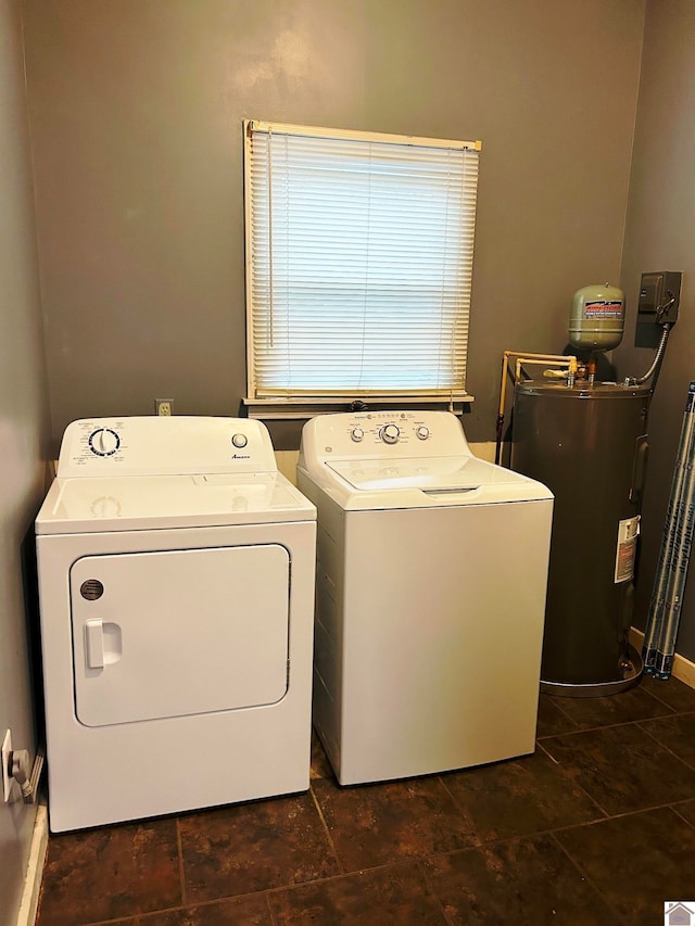 washroom with separate washer and dryer and electric water heater