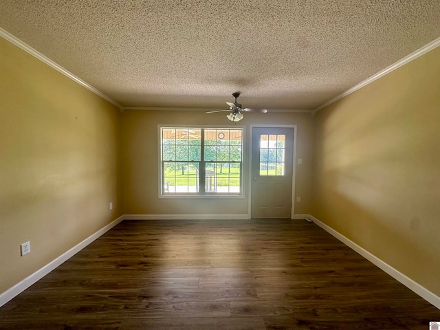 unfurnished room featuring ornamental molding, ceiling fan, and dark hardwood / wood-style floors