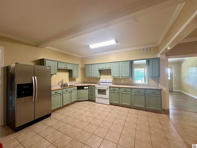 kitchen with green cabinetry, light hardwood / wood-style floors, white appliances, sink, and ornamental molding