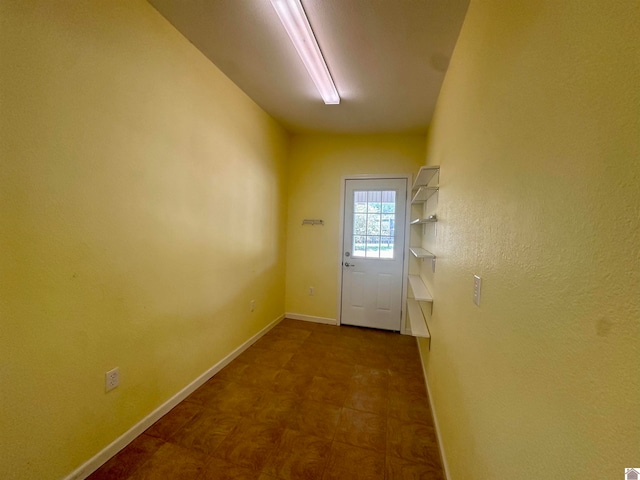 entryway with tile flooring