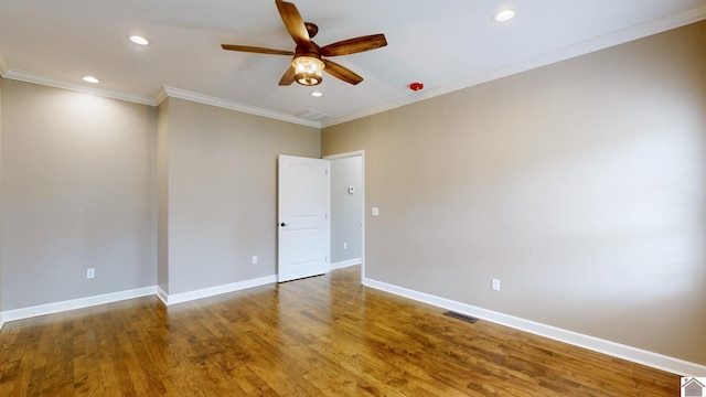 unfurnished room with wood-type flooring, ceiling fan, and crown molding