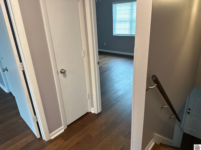 hall featuring dark wood-type flooring